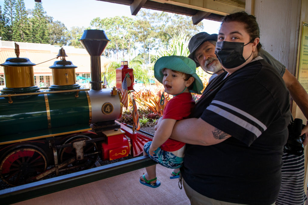 Traveling with family, grandchild and daughter, is doing things you would probably skip, like riding the train around the Dole Plantation.