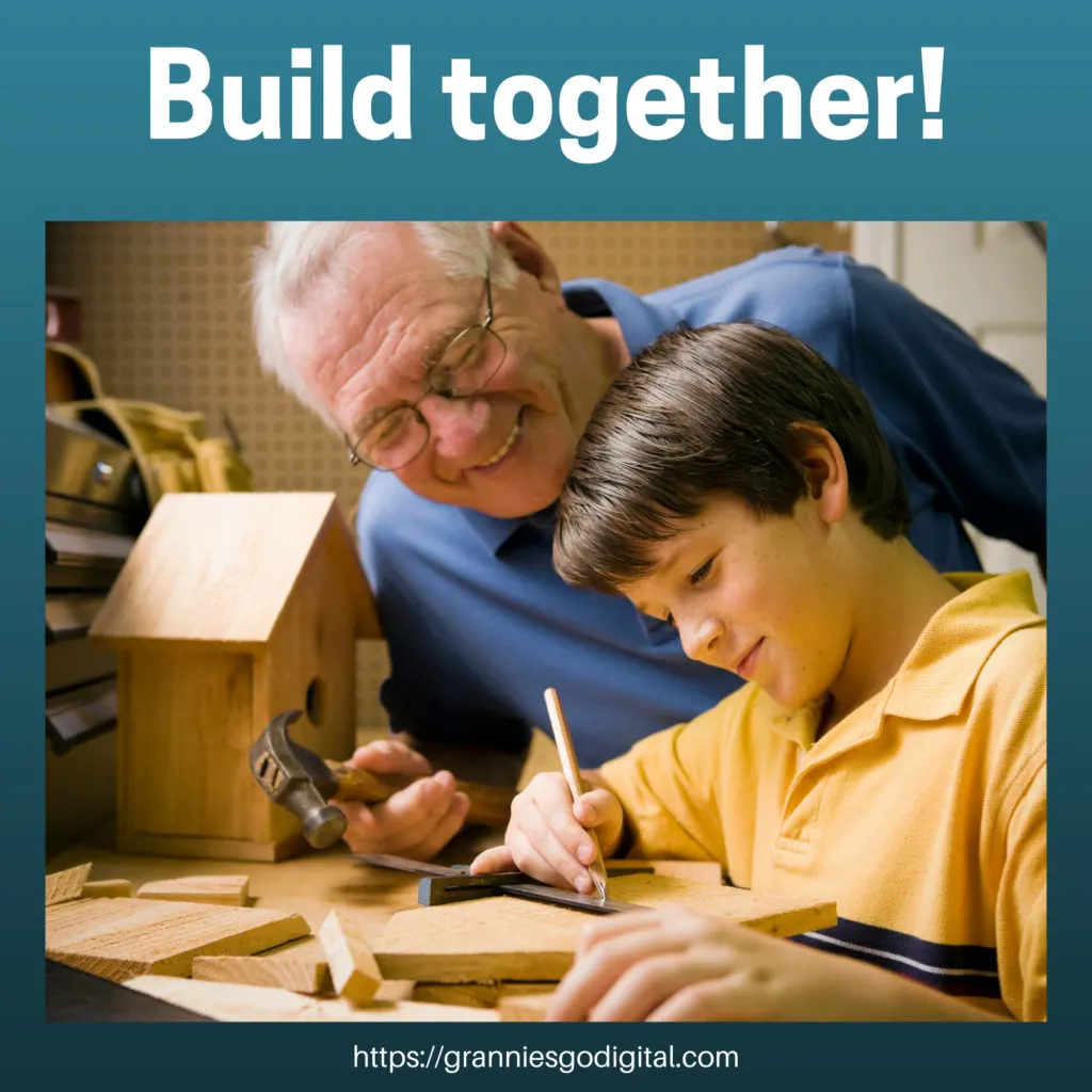 Grandpa and grandson build something together.